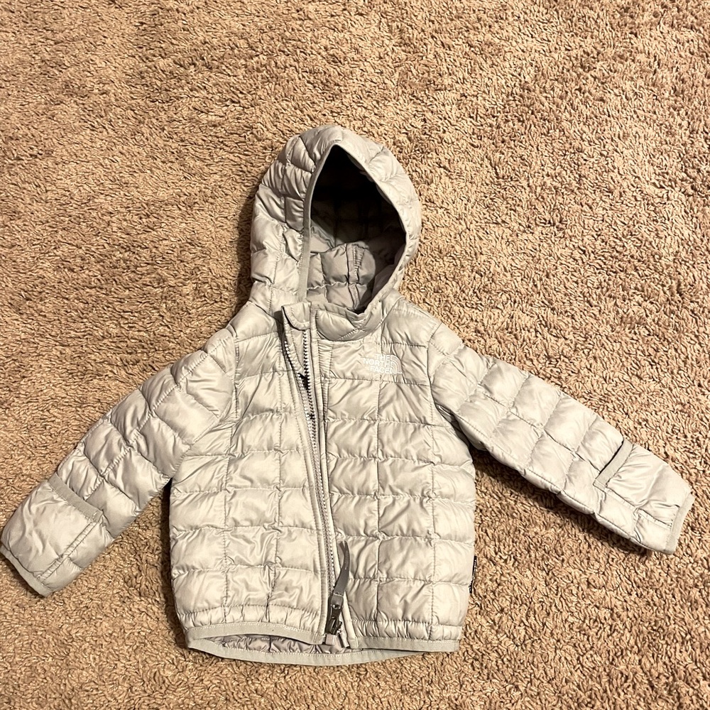 The North Face light weight puff jacket.